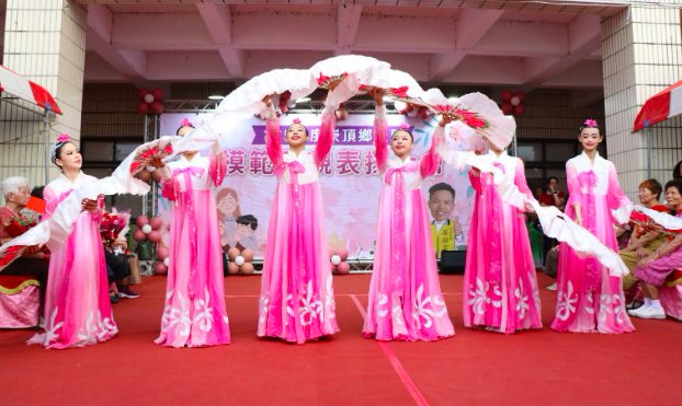 The dance troupe performs